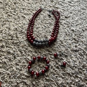 Necklace, bracelet, and earrings